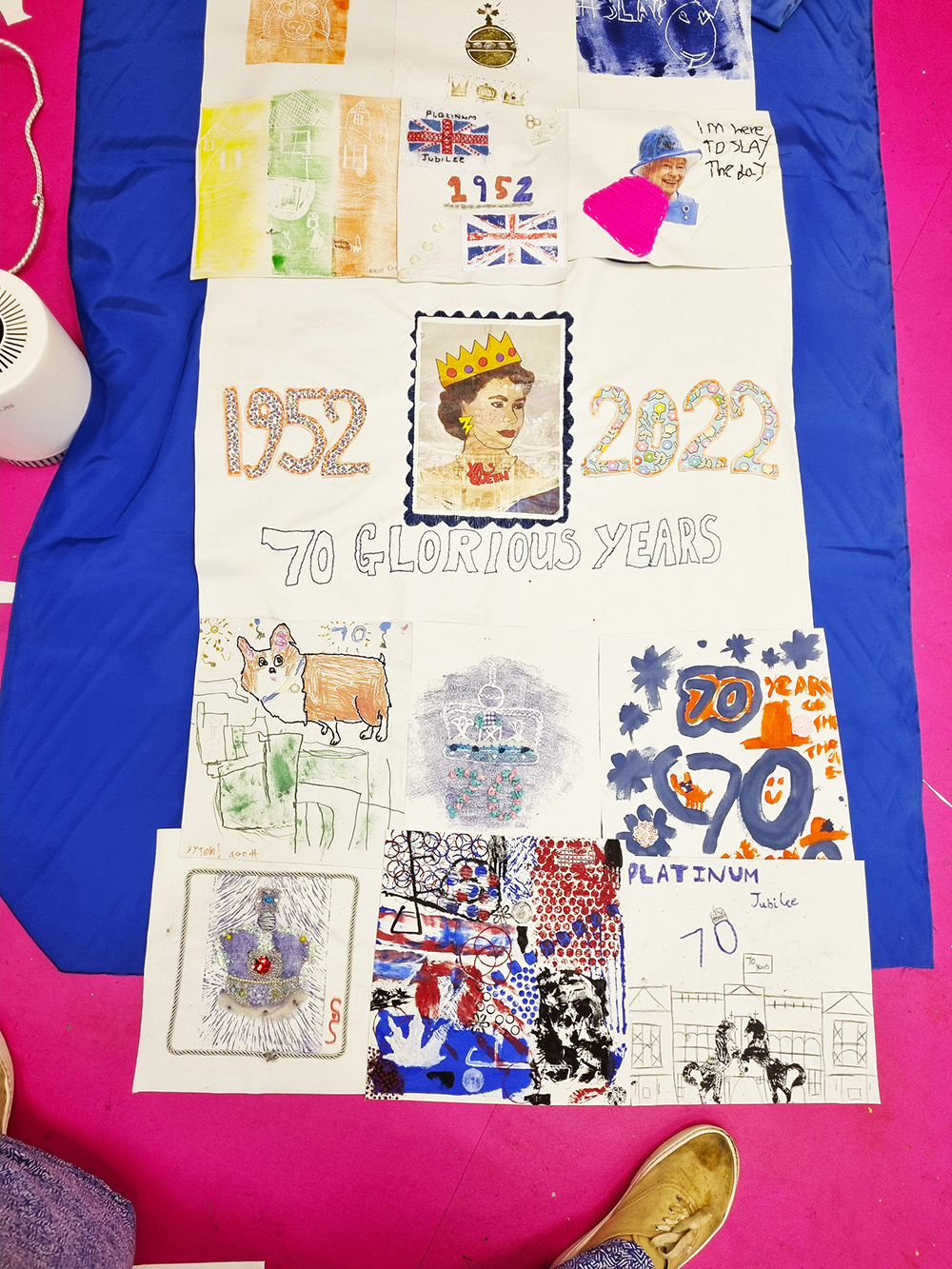 piecing the giant artwork for the Queen's Jubilee together